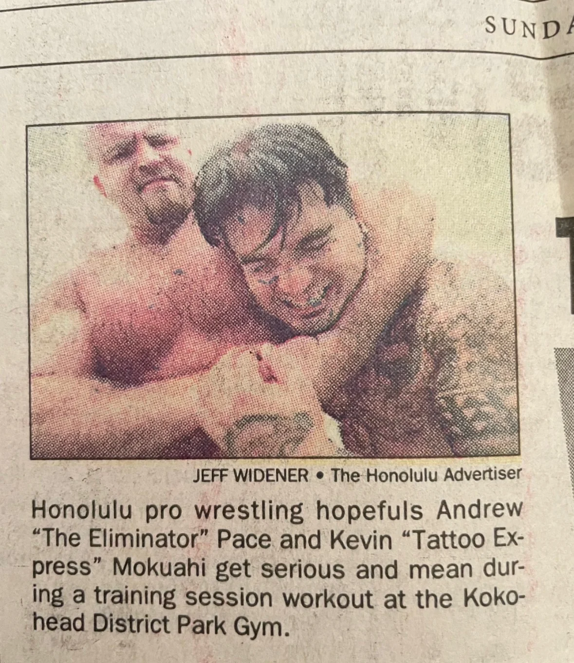 Honolulu Advertiser photograph by Jeff Widener — Andrew The Eliminator Pace and Kevin Tattoo Express Mokuahi training at Kokohead District Park Gym